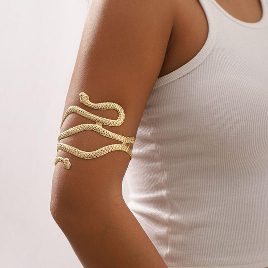 Serpentine Grace 18K Gold-Plated Cuff – Sculpted Elegance